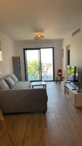 Séjour cosy avec vue mer, Clim et Netflix