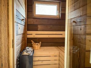Ferienwohnung Ginkgo mit verwunschenem Garten & privater Sauna