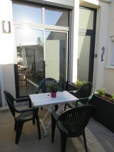 Maisonnette avec terrasse et parking