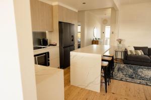 Family-Friendly Escape Walk to Cafés & Creek