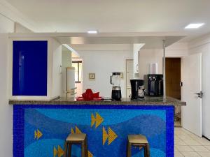 Apartamento em condomínio com acesso à praia