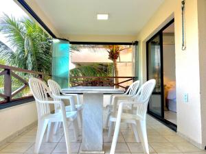 Apartamento em condomínio com acesso à praia