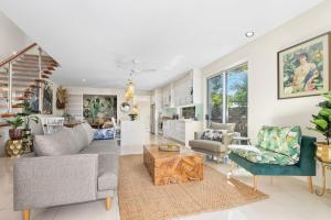 Tropical Oasis - Creekside Townhouse by uHoliday