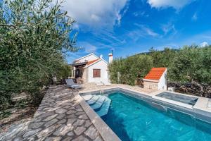 Holiday house Ivan with heated pool