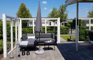 Breskens Chalet Meeresrauschen mit Zaun Haus Nr J251