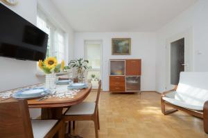 Bright Stylish Warsaw Apartment with Parking & Balcony by Noclegi Renters