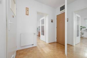 Bright Stylish Warsaw Apartment with Parking & Balcony by Noclegi Renters