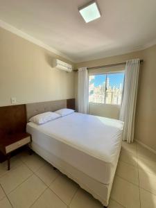 Apto Avenida Central 2 Dormitórios e churrasqueira