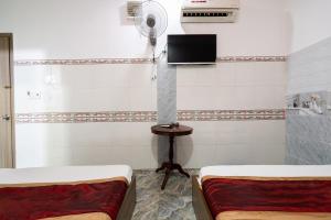 Collection O District 12 - Mau Tim Hotel