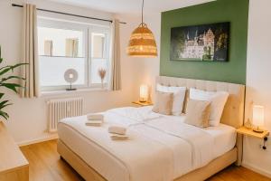 Wohlfühlapartment, Parkplatz, Boxspringbetten, Massagesessel, Nespresso, 1Gbit LAN & WIFI, Innenstadt - 3hvězdičkové hotely ve městě Wolfsburg