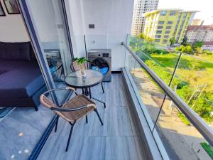 Comfort living one bedroom apartment with fully equipped gym swimming pool private parking space, child play area and amazing scenic views