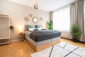 Boho Living Apartments - Historic City Center with Free Parking by HERO HOMES
