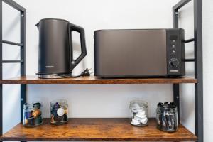 Boho Living Apartments - Historic City Center with Free Parking by HERO HOMES