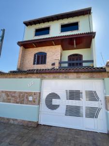 Casa Completa com Piscina 3 Quartos 2 vagas de Garagem