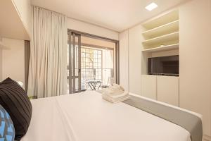 Aconchegante studio c cama Queen no Brooklin