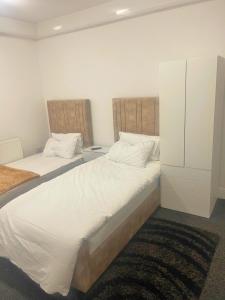 studio apartment with small kitchen and bathroom