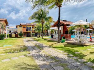 Casas no Residencial Moradas de Israel, com 3 suítes (todas com ar condicionado), internet 300MBPS e área gourmet privativa a aproximadamente 200m da praia de Taperapuã, (Axé Mói)com piscinas, sauna, portaria 24hrs