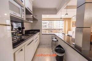 Apto Praia das Pitangueiras com Piscina aquecida