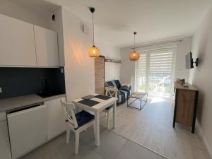 Łopuszańska 57 by Solarento