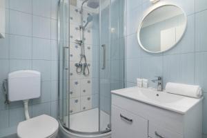 High Apartment with a View of the Old Town by Noclegi Renters