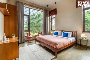 StayVista at Zen Grove with Bonfire, Lawn