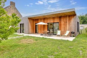Casa ZaO Jolie maison en bois brut de 50m2 à proximité des plages