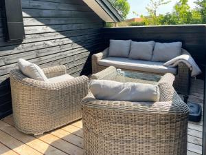 Lovely Black Wooden House Near Tisvilde Hegn