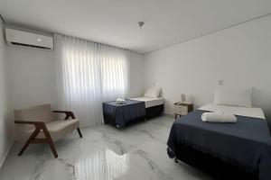 Casa com Piscina a 5 min da Praia – 3 Quartos, AC