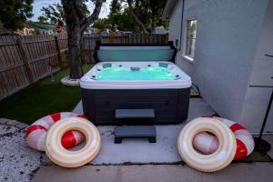 Resort Style Backyard Tiki Bar Pool Hot Tub