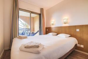 LX113 Grand T2 lumineux - vue mer - piscine plage