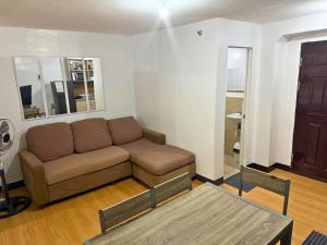 2-Bedroom Condo in Imus Cavite with UNLI WIFI, 50" TV, Netflix, Family Computer, Pool