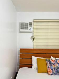 2-Bedroom Condo in Imus Cavite with UNLI WIFI, 50" TV, Netflix, Family Computer, Pool