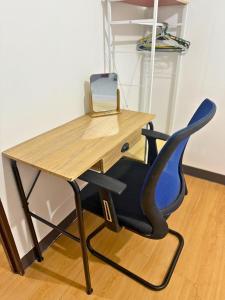 2-Bedroom Condo in Imus Cavite with UNLI WIFI, 50" TV, Netflix, Family Computer, Pool