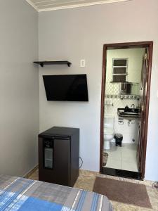 Suíte aconchegante no coração de Belém