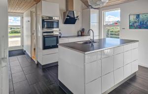 Cozy Home In Løkken With Sauna