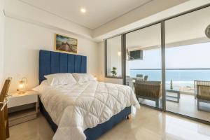 CB Lujoso Apartasuit -Vista al mar-linda piscina-cerca al Aeropuerto