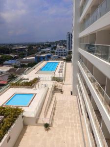 CB Lujoso Apartasuit -Vista al mar-linda piscina-cerca al Aeropuerto