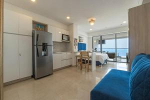 CB Lujoso Apartasuit -Vista al mar-linda piscina-cerca al Aeropuerto