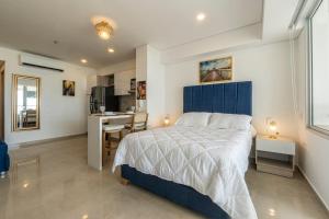 CB Lujoso Apartasuit -Vista al mar-linda piscina-cerca al Aeropuerto