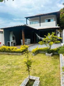 Charmosa casa perto da praia