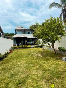 Charmosa casa perto da praia