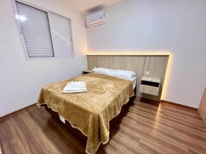 Apartamento Inteiro - 2 Quartos com AC - Wifi 1000mb - Piscina - 1 Vaga de Garagem - Elevador - Sacada Gourmet - Indicado para Grupos, Hospedes a Trabalho, Família e Pets