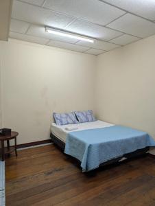 Suite Práctica de Dos Ambientes Cocina y Sofá Cama