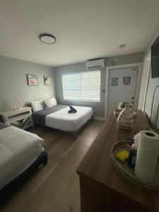 2 Coastal Units • Walk to Beach • Patio Parking