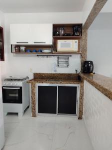 Refúgio Peró - Praia, piscina e churrasqueira