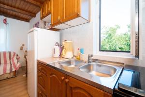 Apartments with parking space Kampor, Rab - 5014