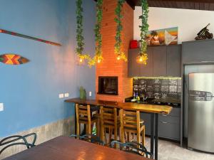 Casa com piscina em Itapema próximo a praia