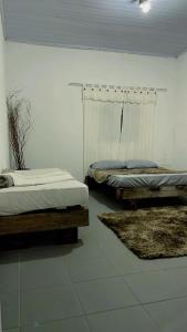 Espaço fazendinha por do Sol da piscina