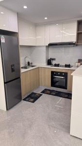 executive catchy two bedroom apartment with swimming pool fully furnished gym ample parking space children playing ground and amazing city views in lavington