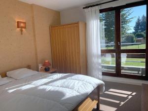 Appartement 2* à Autrans - 6 pers, balcon sud, parking, garage privé - FR-1-737-47